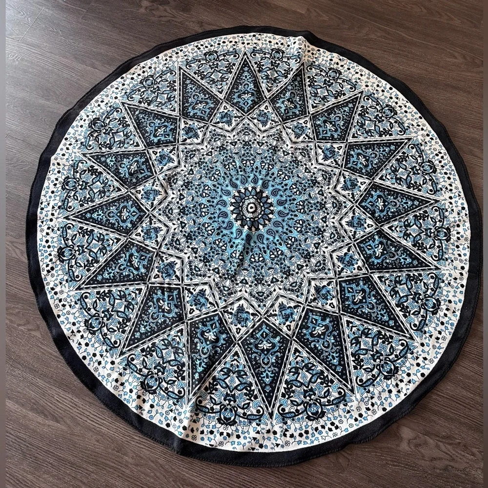 Round Blue Mandala Beach Towel in blue and black print